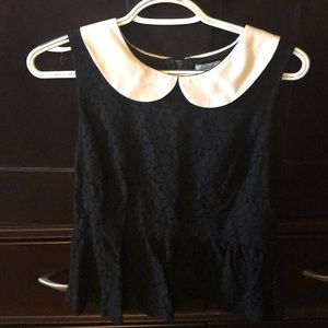 Sleeveless lace peplum top